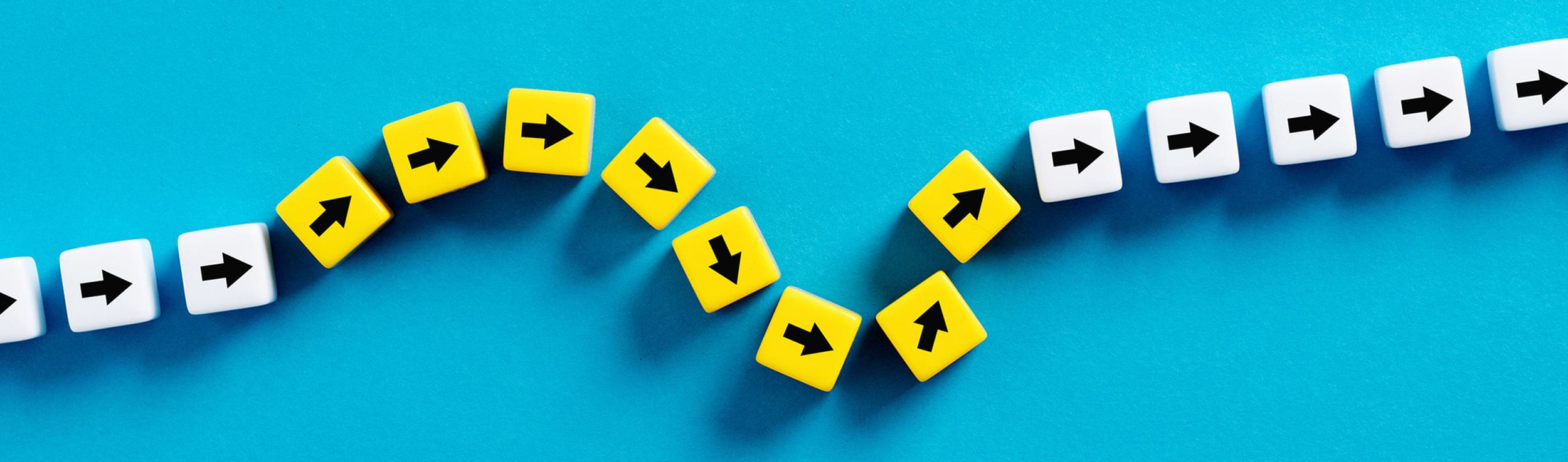 Arrows forming a curved line