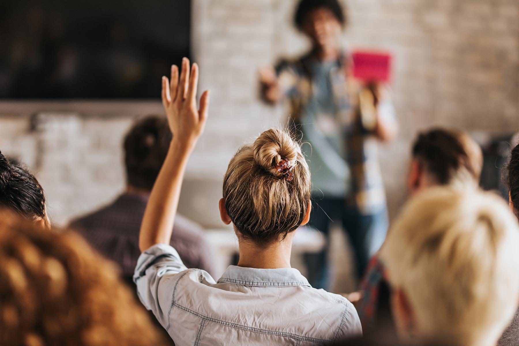 Person raising hand