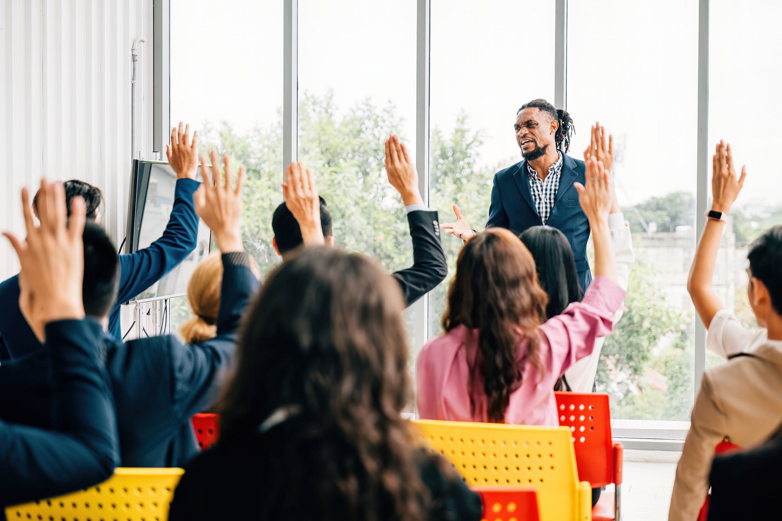 Group raising hands
